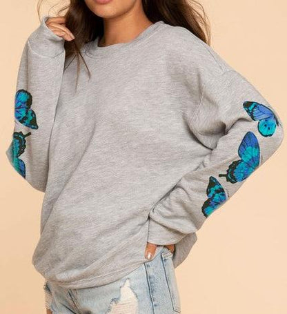 Butterfly printed sweatshirts on sleeves